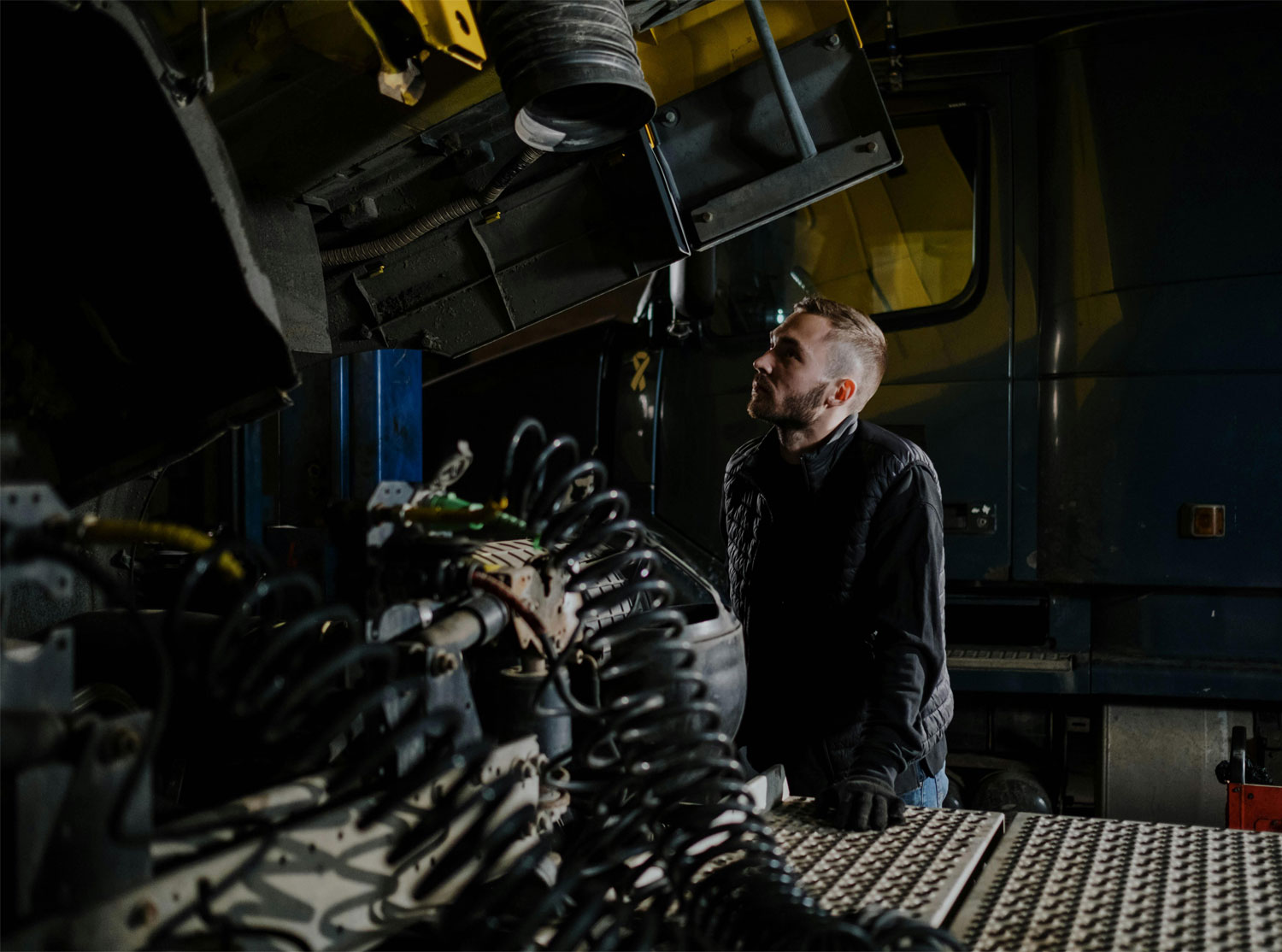 Hi-End technicians repairing a commercial truck in the shop